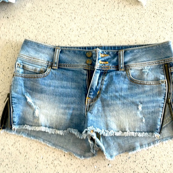 Victoria’s Secret hipster denim shirts. Size 8. Zippers on sides work. Blue. - Picture 1 of 6